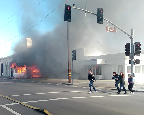 Sub employees running from burning building